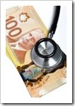 Stethoscope and Canadian dollar